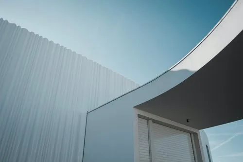 Abstract architecture with overlapping layers and irregular shapes